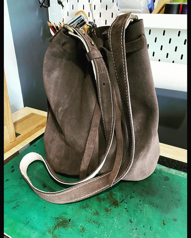 suede shoulder bag dark